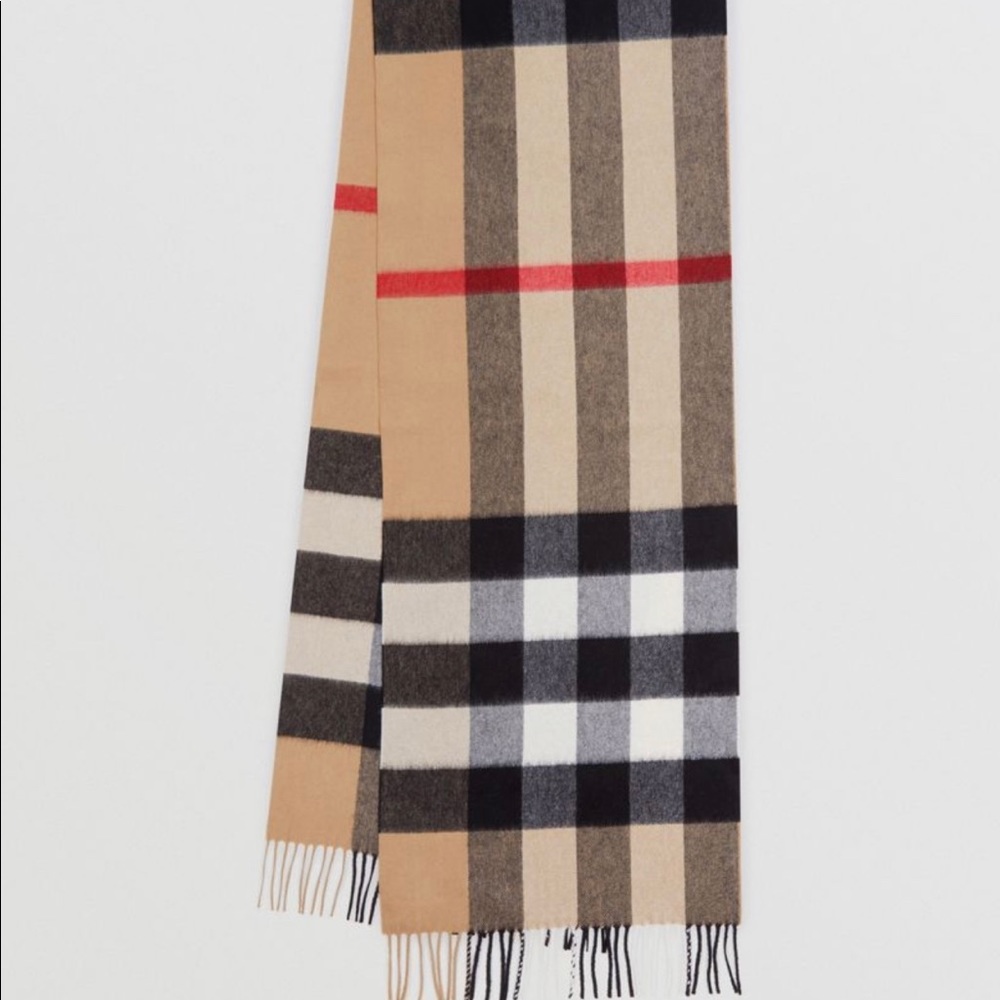 Never worn brand new Burberry Cashmere scarf.